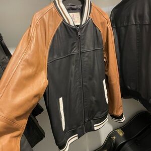 Wilsons Leather Black and Tan Varsity Jacket